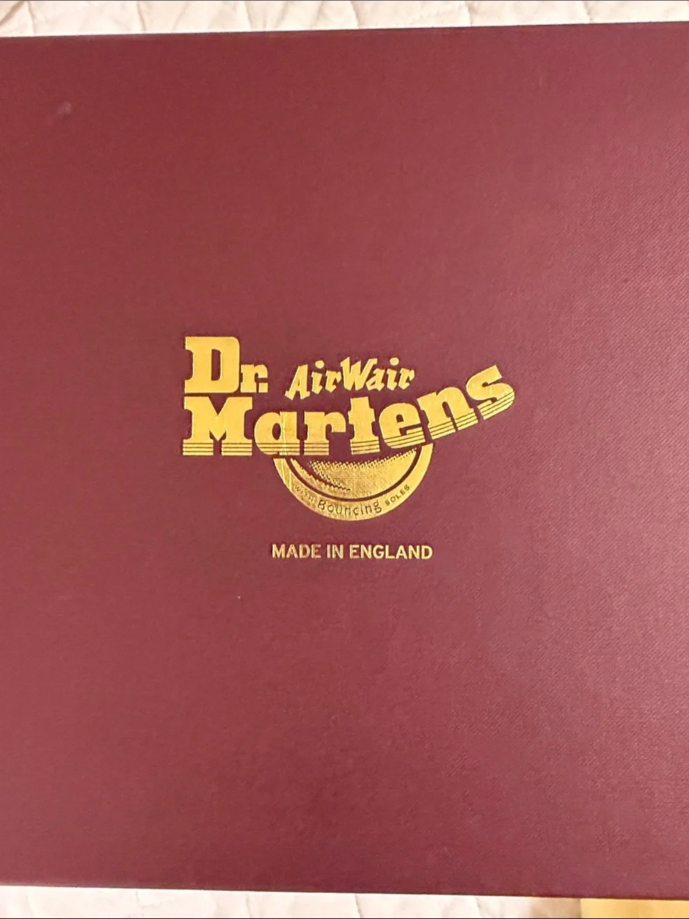 Dr. Martens Black Leather Hiking-Style Boots with Yellow Stitching